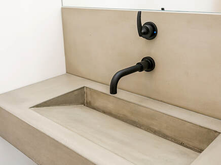 Custom-concrete-sink-slanted