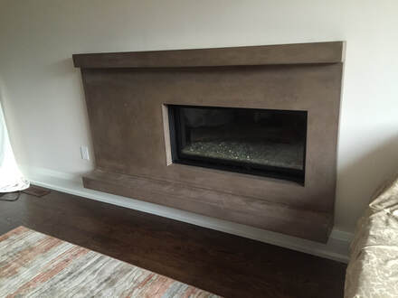 off-center-Concrete-Fireplace